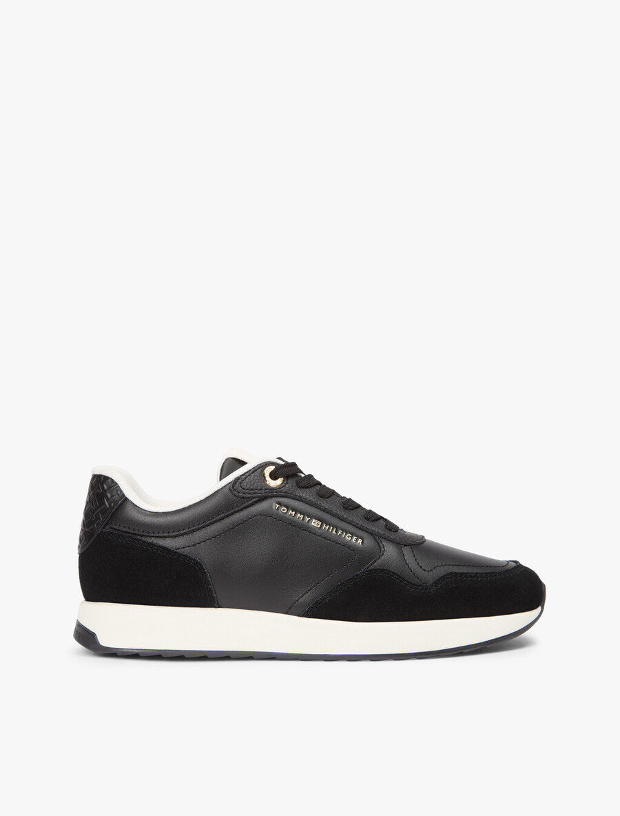 sneaker aus geprägtem th-monogramm-leder