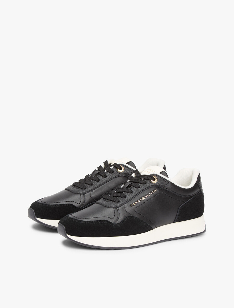 sneaker aus geprägtem th-monogramm-leder