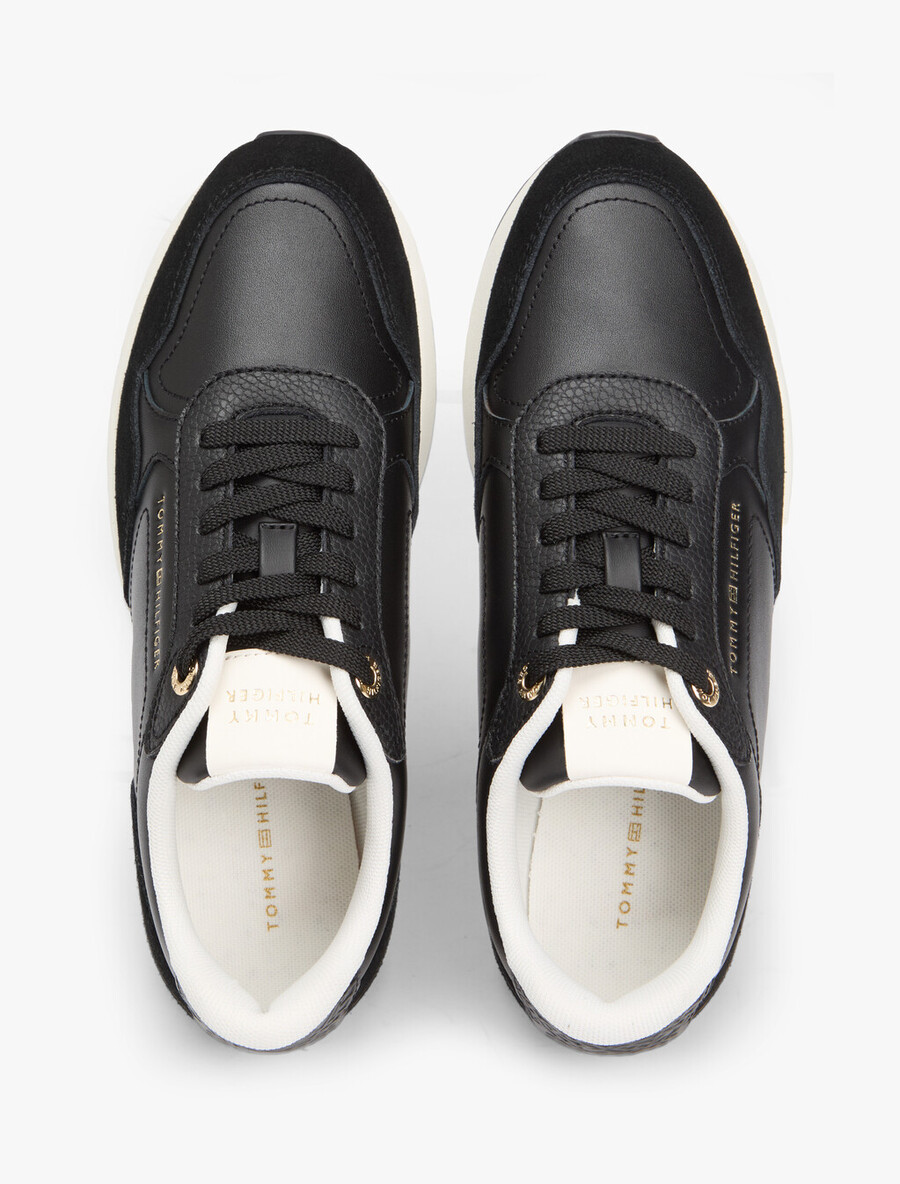 sneaker aus geprägtem th-monogramm-leder