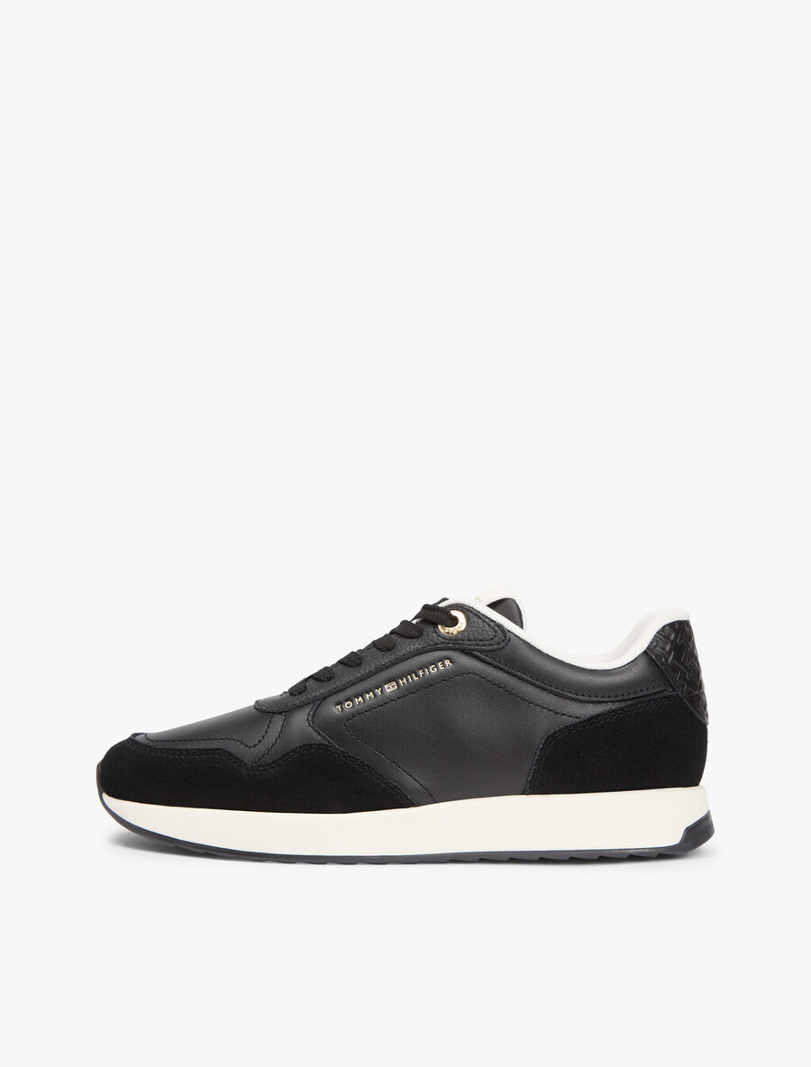 sneaker aus geprägtem th-monogramm-leder